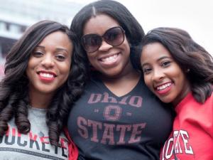 Students smiling and wearing Ohio State shirts